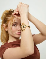 Bangle bracelet with a striking central eye