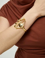 Bangle bracelet with a striking central eye