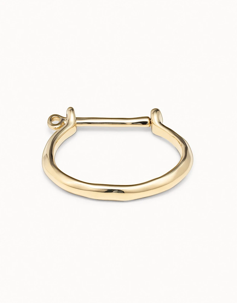 Bangle bracelet with a shackle shaped clasp