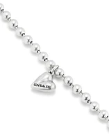 Beaded bracelet with a heart charm