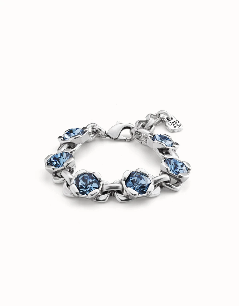 Link chain bracelet with a blue crystal