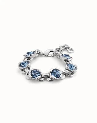 Link chain bracelet with a blue crystal