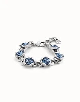 Link chain bracelet with a blue crystal