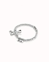 Beaded stretch bracelet with a dragonfly