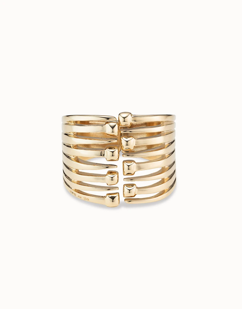 Bangle bracelet with multiple nail heads