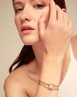 Bangle bracelet with central crystal