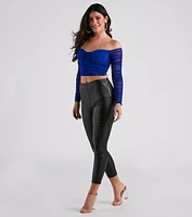 Top Spot Coated Faux Leather Skinny Pants