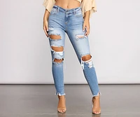 Mid Rise Frayed Cropped Skinny Jeans