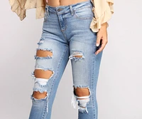 Mid Rise Frayed Cropped Skinny Jeans