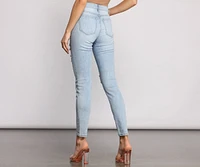 Mid Rise Destructed Skinny Jeans