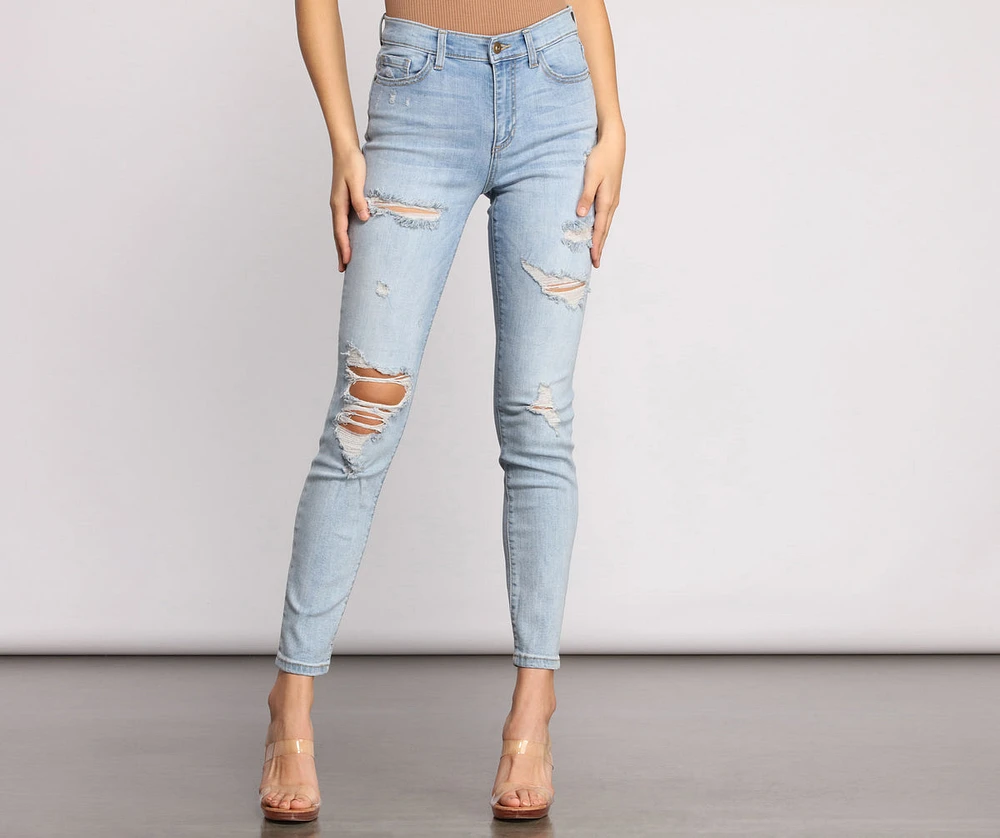 Mid Rise Destructed Skinny Jeans