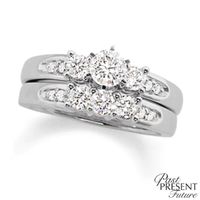 1-1/2 CT. T.w. Diamond Three Stone Bridal Set in 14K White Gold