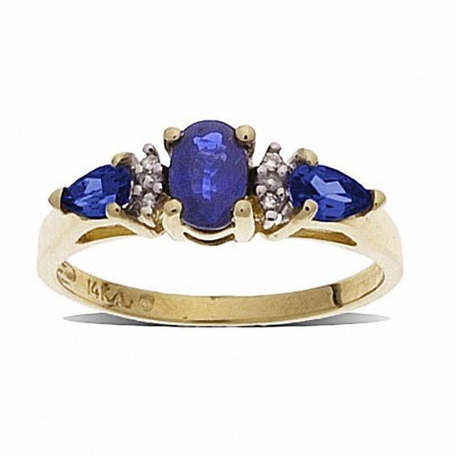 Blue Sapphire Three Stone Ring in 10K Gold with Diamond Accents