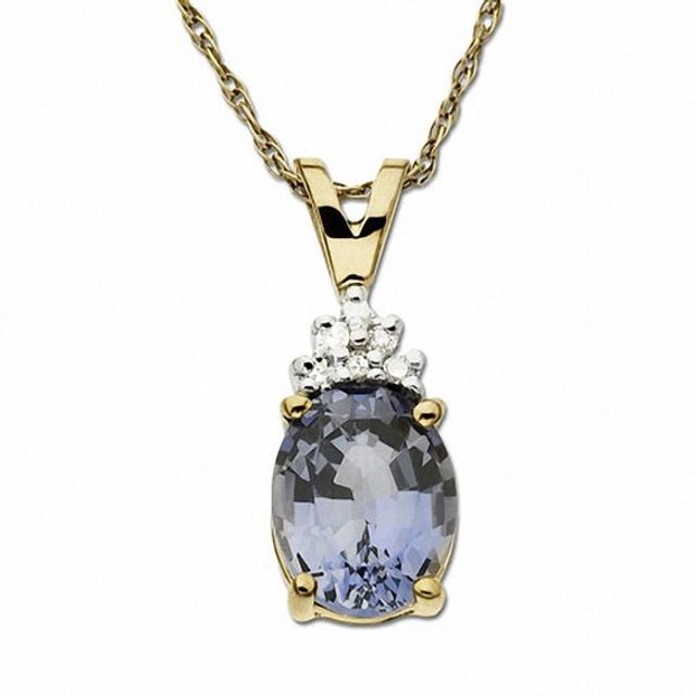 Oval Lab-Created Ceylon Sapphire Pendant in 10K Gold with Diamond Accents