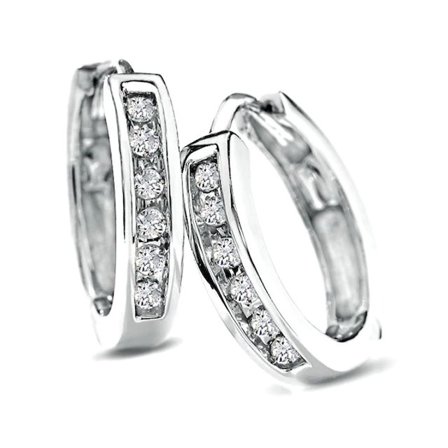 1/10 CT. T.w. Diamond Huggie Hoop Earrings in 10K White Gold