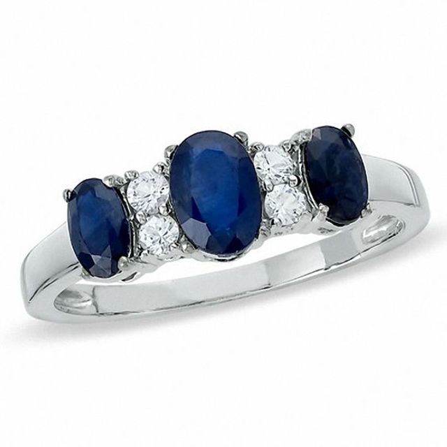 Oval Blue Sapphire Three Stone Ring in 10K White Gold with White Sapphire Accents