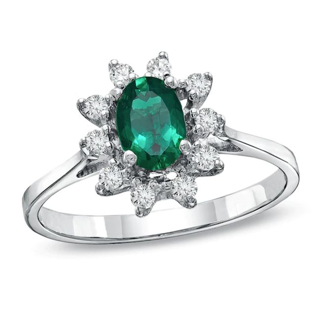 Oval Emerald and 1/7 CT. T.w. Diamond Frame Engagement Ring in 14K White Gold