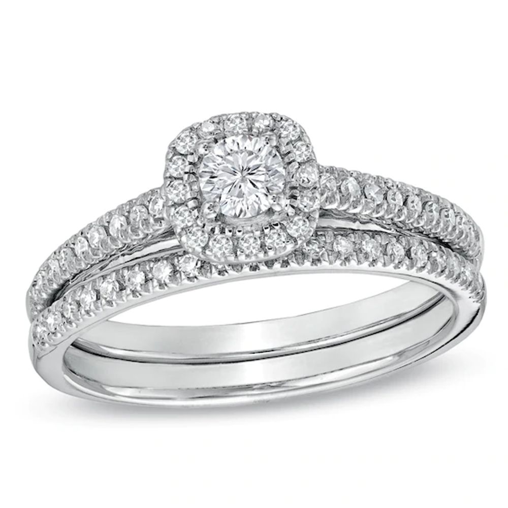 1/ CT. T.w. Diamond Frame Bridal Set in 14K White Gold