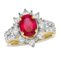 Oval Lab-Created Ruby and White Sapphire Frame Ring in 10K Gold with Diamond Accents