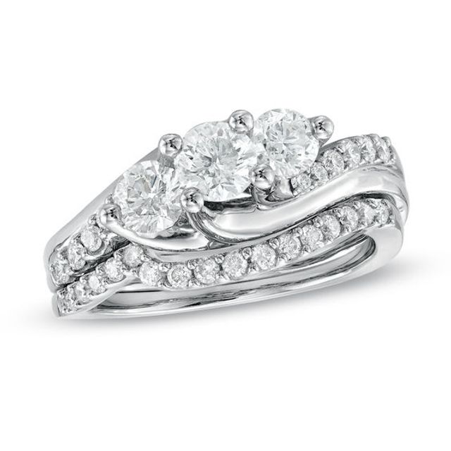 1-1/4 CT. T.w. Diamond Three Stone Bridal Set in 14K White Gold