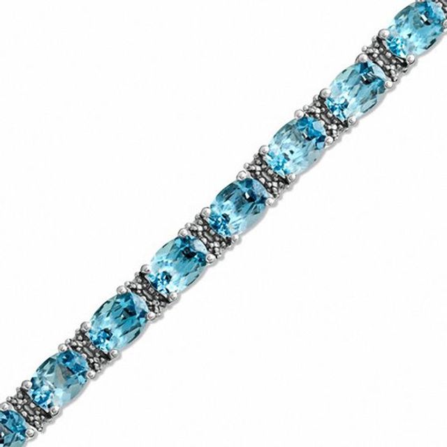 Oval Blue Topaz and Diamond Accent Line Bracelet in Sterling Silver - 7.25"