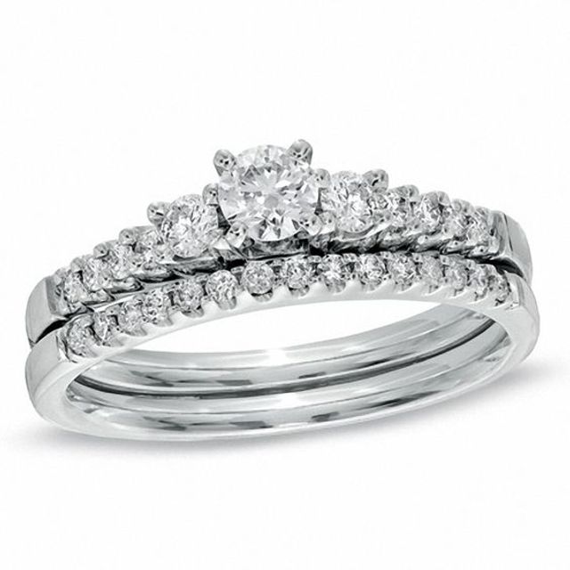 5/8 CT. T.w. Diamond Three Stone Bridal Set in 14K White Gold