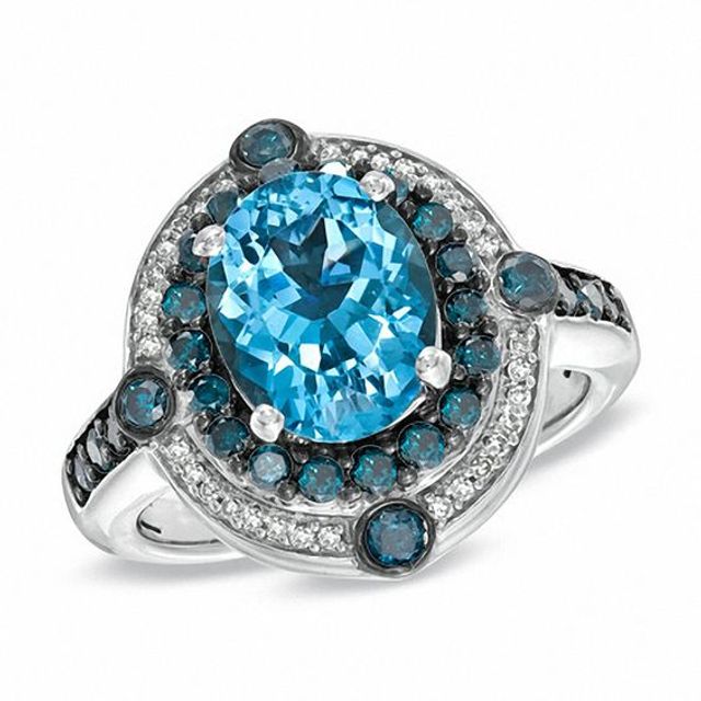 Oval Blue Topaz and 3/4 CT. T.w. Enhanced Blue and White Diamond Ring in Sterling Silver
