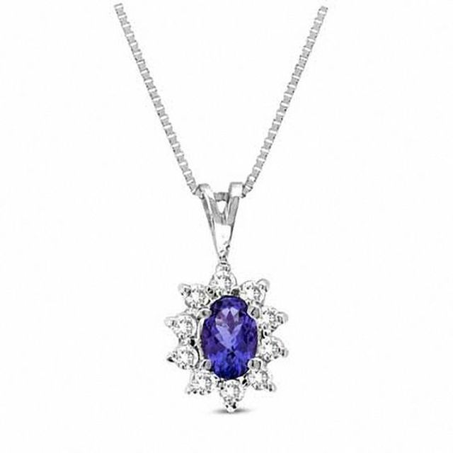 Oval Tanzanite and 1/7 CT. T.w. Diamond Frame Pendant in 14K White Gold