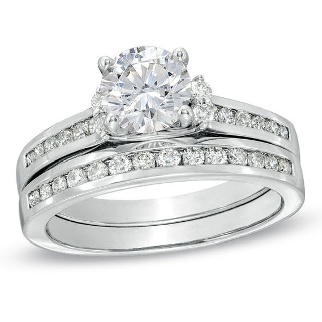 1-1/2 CT. T.w. Certified Diamond Bridal Set in 14K White Gold (I/I1)