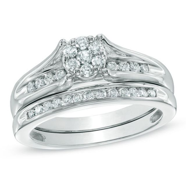 1/2 CT. T.w. Diamond Cluster Bridal Set in 10K White Gold