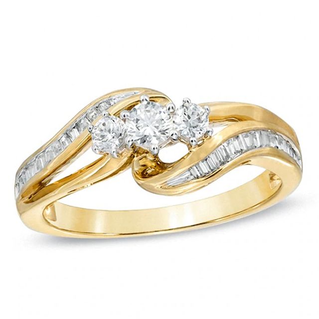 1/2 CT. T.w. Diamond Three Stone Ring in 10K Gold