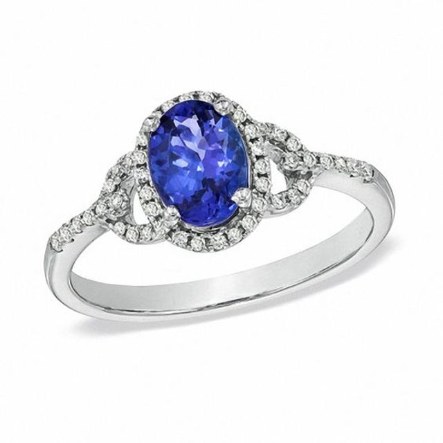 Oval Tanzanite and 1/6 CT. T.w. Diamond Buckle Ring in 10K White Gold