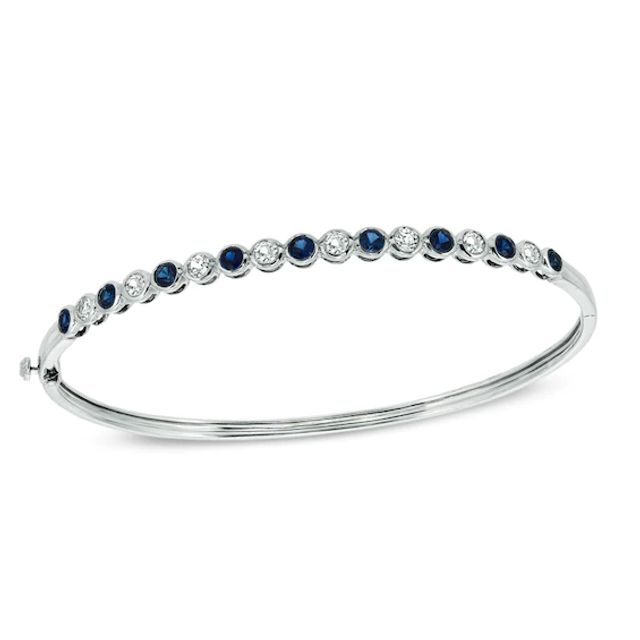 Oval Lab-Created Blue and White Sapphire Bangle in Sterling Silver