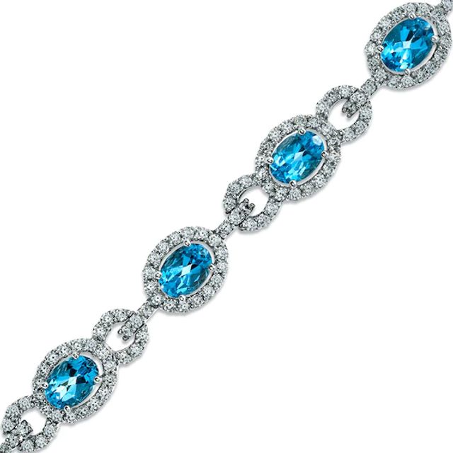 Oval Blue Topaz and Lab-Created White Sapphire Bracelet in Sterling Silver - 7.25"