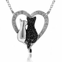 1/5 CT. T.w. Enhanced Black and White Diamond Cats Pendant in Sterling Silver
