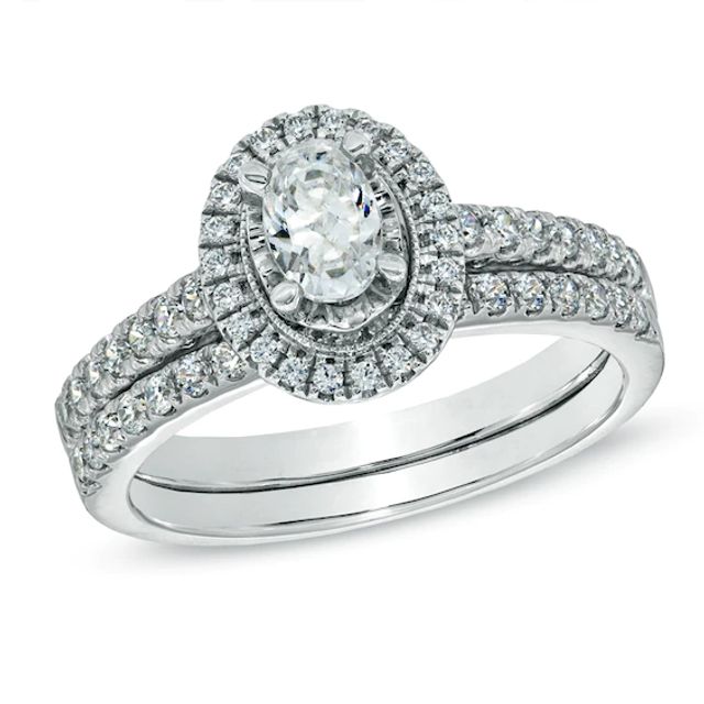 Celebration Ideal 1 CT. T.w. Oval Certified Diamond Frame Vintage-Style Bridal Set in 14K White Gold (J/I1)