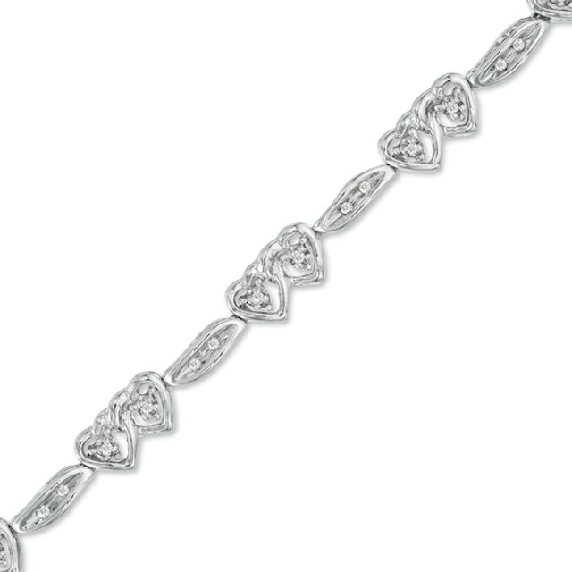 1/6 CT. T.w. Diamond Interlocked Hearts Station Bracelet in Sterling Silver