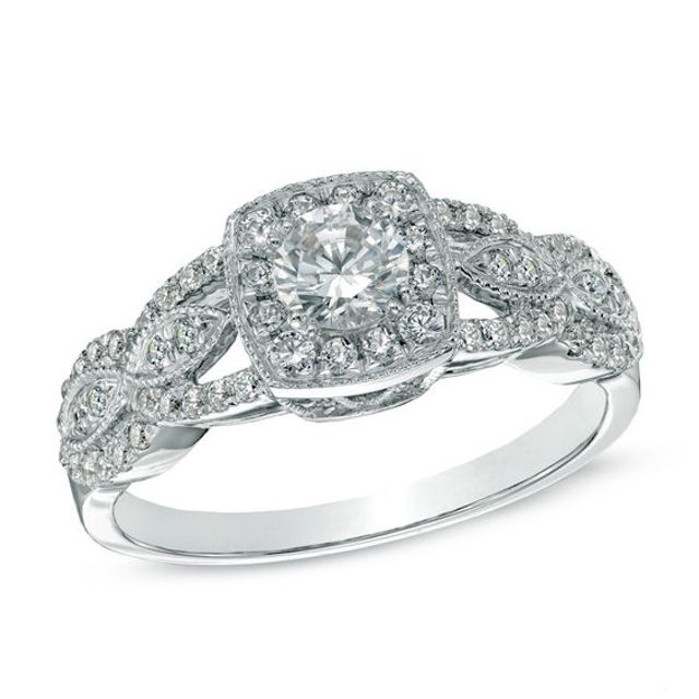 Celebration Ideal 3/4 CT. T.w. Certified Diamond Twist Frame Engagement Ring in 14K White Gold (I/I1)