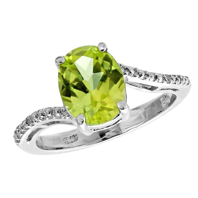 Oval Peridot and Diamond Accent Ring in Sterling Silver