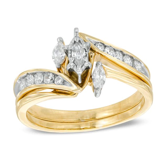 1/2 CT. T.w. Marquise Diamond Three Stone Slant Bridal Set in 10K Gold