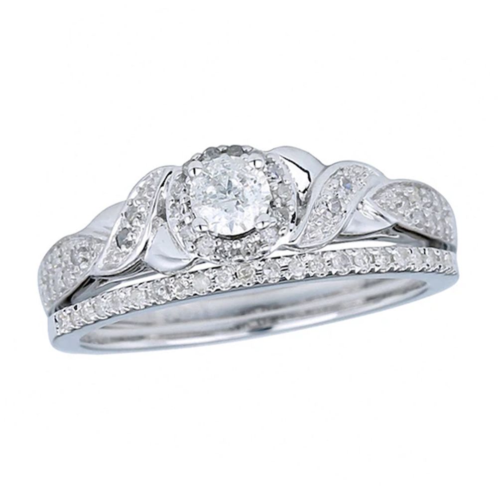 1/2 CT. T.w. Diamond Frame Bridal Set in 10K White Gold