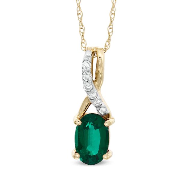 Oval Lab-Created Emerald and Diamond Accent Twist Pendant in 10K Gold