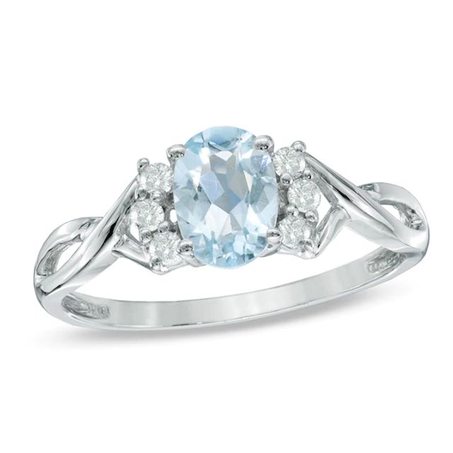 Oval Aquamarine and 1/8 CT. T.w. Diamond Ring in 10K White Gold