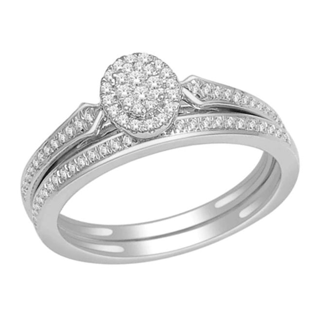 1/5 CT. T.w. Diamond Cluster Bridal Set in 10K White Gold