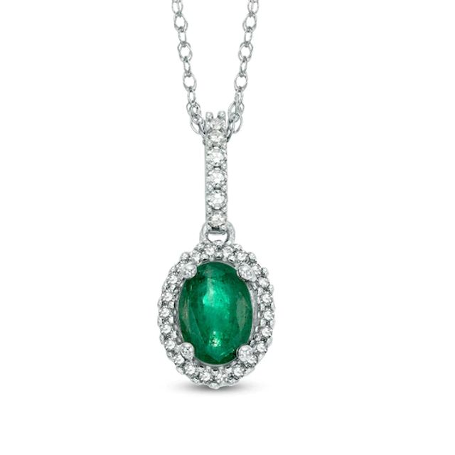 Oval Emerald and 1/6 CT. T.w. Diamond Frame Pendant in 14K White Gold