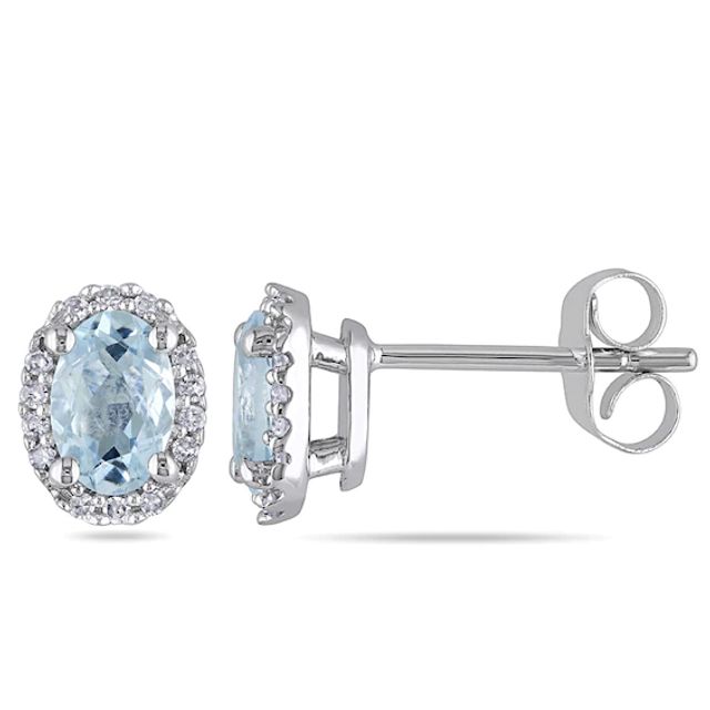 Oval Aquamarine and Diamond Accent Frame Stud Earrings in 10K White Gold