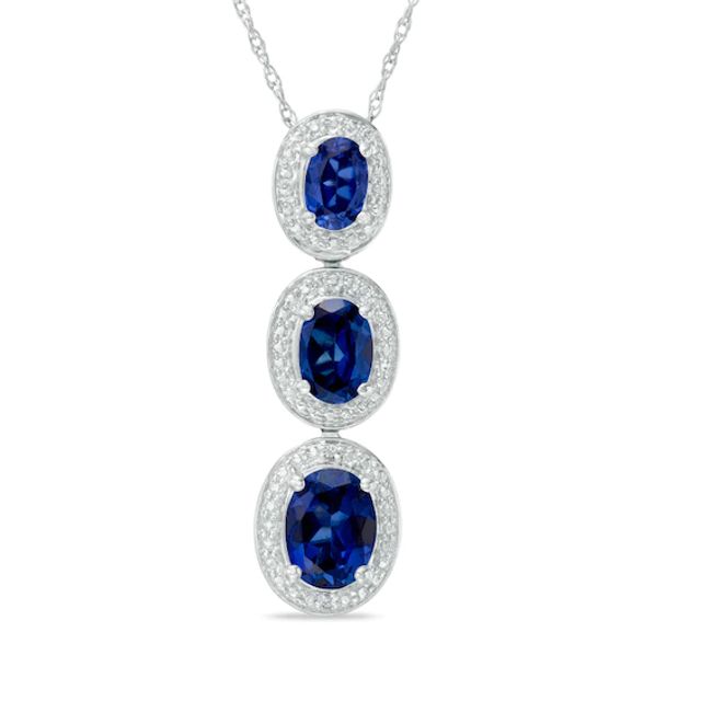 Oval Lab-Created Blue Sapphire and Diamond Accent Frame Three Stone Pendant in Sterling Silver
