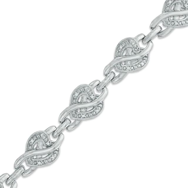 1/10 CT. T.w. Diamond Infinity Overlay Heart Link Bracelet in Sterling Silver - 7.5"