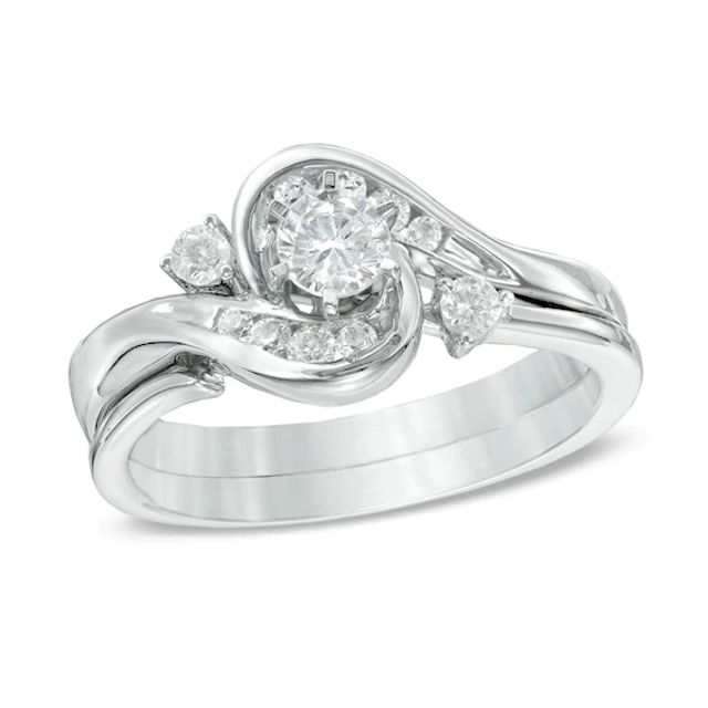 1/2 CT. T.w. Diamond Frame Bypass Bridal Set in 10K White Gold