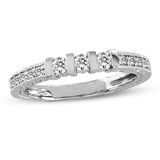 1/3 CT. T.w. Diamond Three Stone Wedding Band in 14K White Gold (I/Si2)